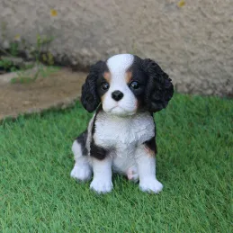 Chiot king charles assis en résine 15 cm
