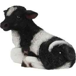 Veau noir et blanc couché en résine