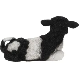Veau noir et blanc couché en résine
