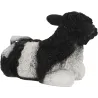 Veau noir et blanc couché en résine