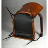 Fauteuil en cuir de buffle, métal et bois verni