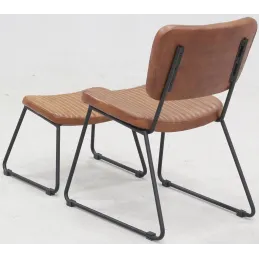 Fauteuil et repose-pieds en cuir  de buffle pleine fleur