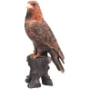 Aigle en résine sur tronc