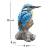 Oiseau martin pêcheur sur tronc en résine