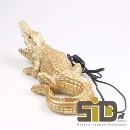 Lampe animal doré en résine