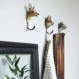 Patère animal en bois sculpté à la main et métal
