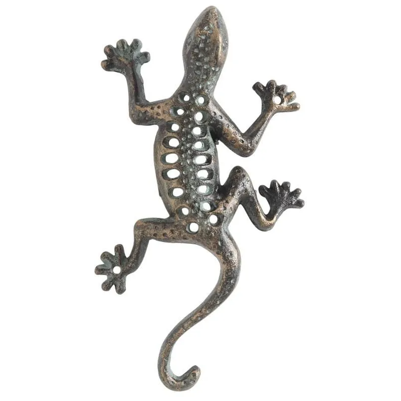 Lézard mural en fonte ajourée