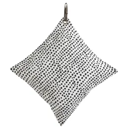 Coussin blanc à pois noirs 45 x 45
