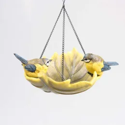 Oiseau dans bain en résine à suspendre