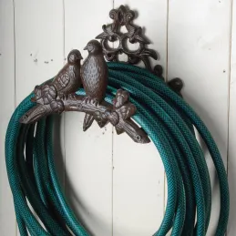 Porte tuyau fonte oiseaux