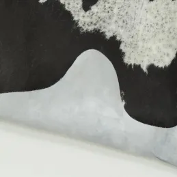 Véritable peau de vache naturelle marron et blanche