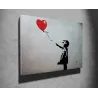 Toile décorative fille avec ballon 100 x 70 cm