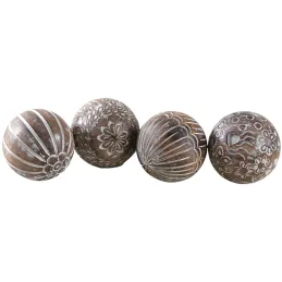 Boules en manguier motifs assortis