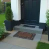 Paillasson en fonte et rouleau coco