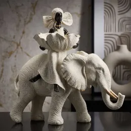 Statuette en polyrésine Femme africaine sur éléphant