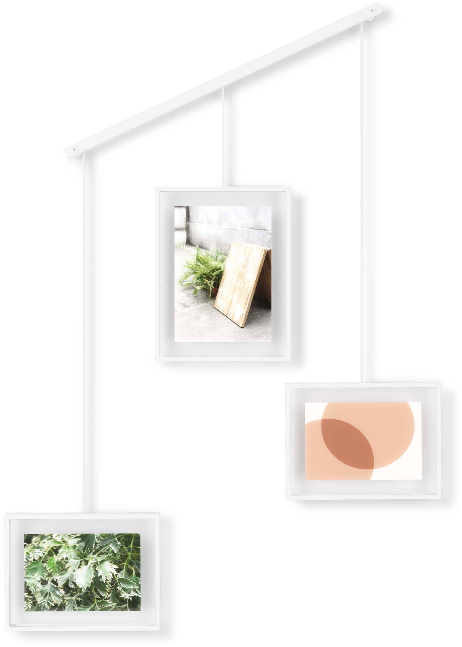 Comment disposer trois cadres photo sur un mur