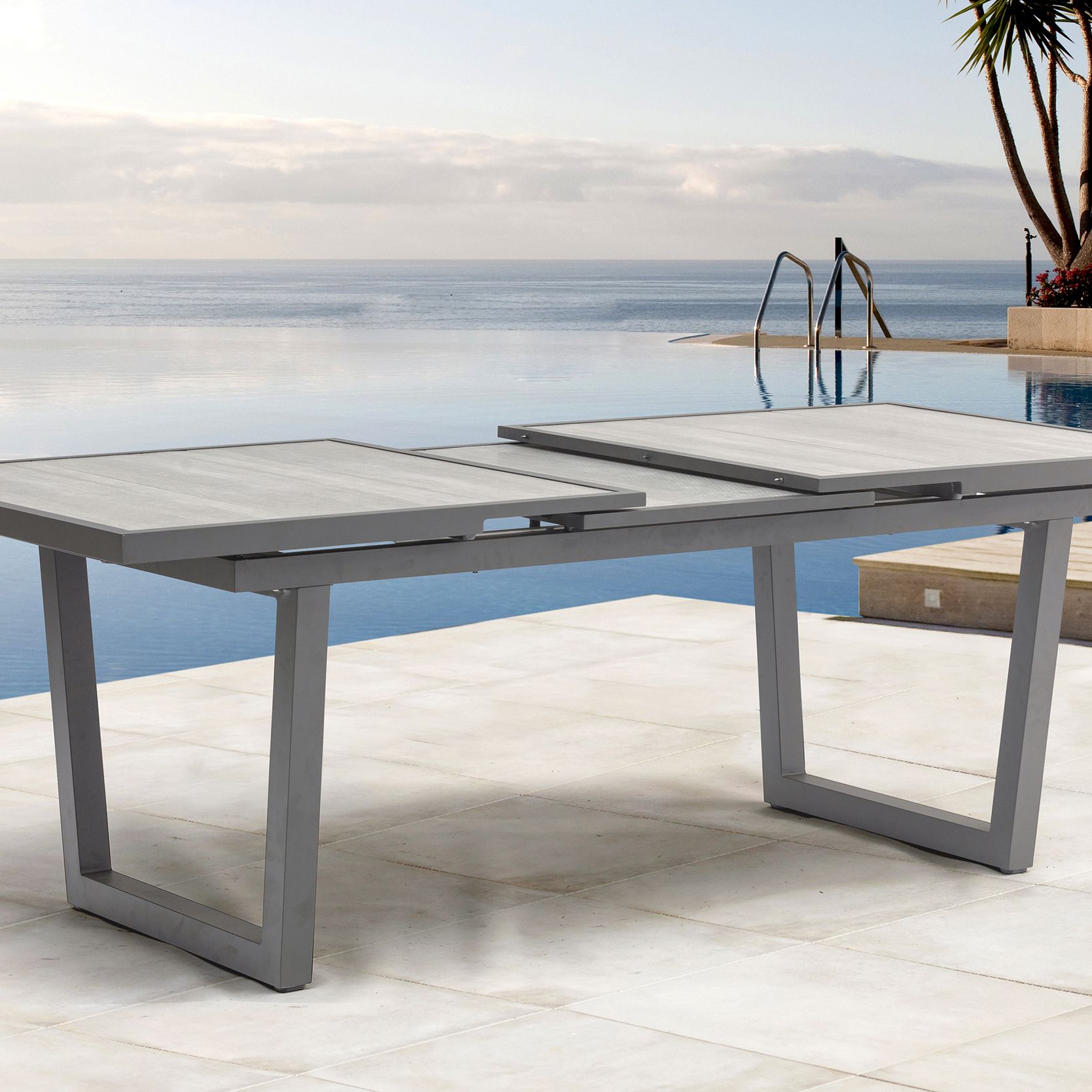 Table de jardin avec rallonge automatique en aluminium et céramique olhos