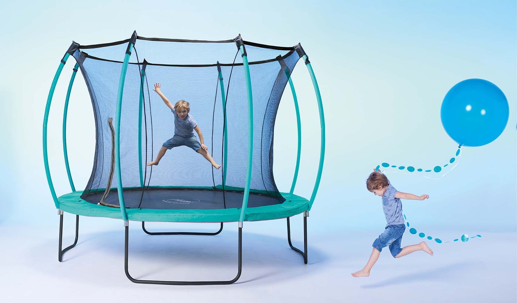 Trampoline junior avec protection réversible turquoise ou rose (244 cm)