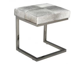 Tabouret design en peau de vache et acier brossé