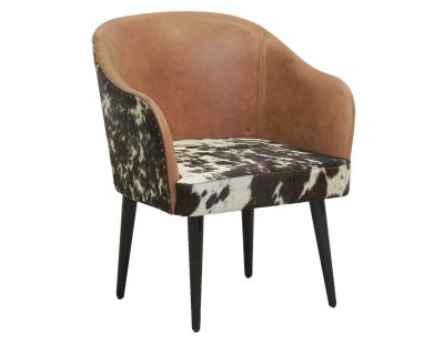 Fauteuil en cuir camel et peau de vache