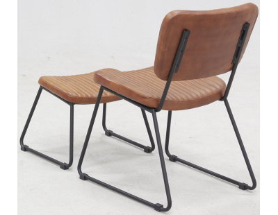 Fauteuil et repose-pieds en cuir  de buffle pleine fleur