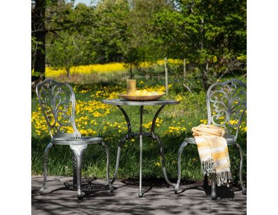 Table ronde et 2 chaises de jardin Nandin