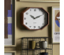 Horloge murale octogonale en résine Factory - KARLSSON