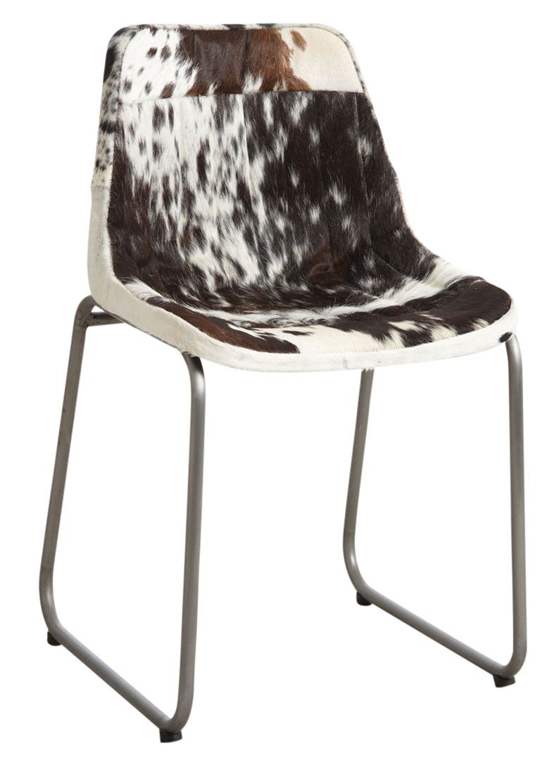 Chaise en peau de vache marron et blanche