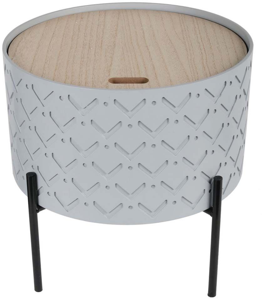 Coffre à motifs sculté sur pieds en métal